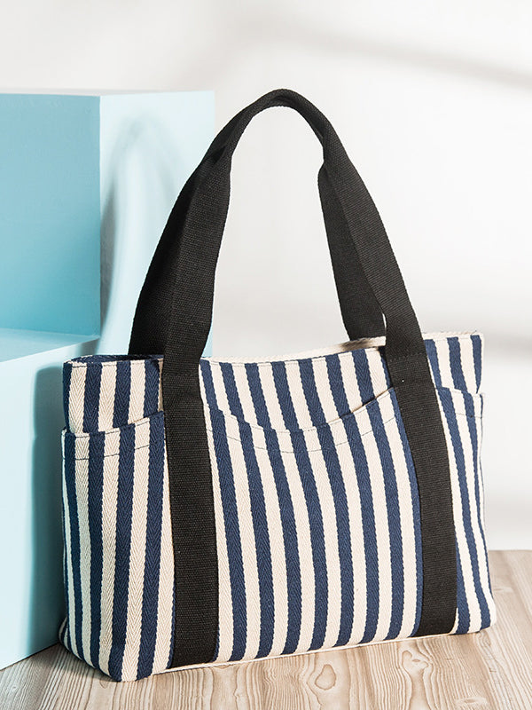 <tc>Чанта на райета VANORA черно, бяло и синьо</tc>